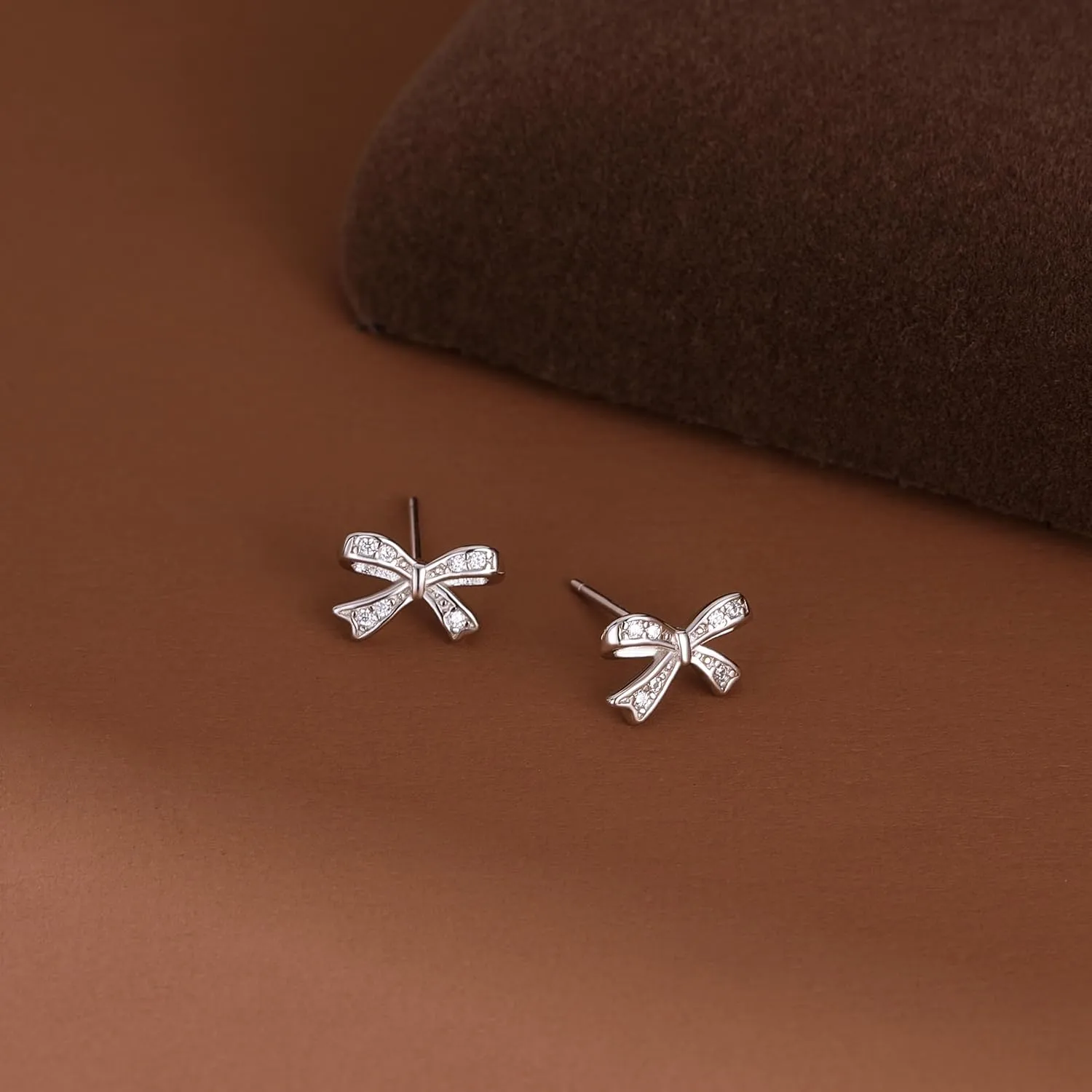 SLUYNZ Solid 925 Sterling Silver Tiny Bow Earrings Stud for Women Teens CZ Bowknot Stud Earrings